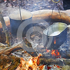 Two pots above the fire.