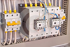 Two powerful power contactors and two circuit breakers in the electrical Cabinet