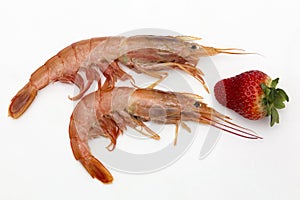 Two prawns and a strawberry