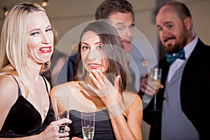 Women Being Watched by Men at Party and Cringing