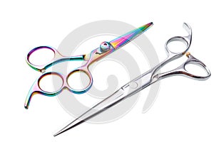 Two professional haircutting scissors isolated, with clipping path.