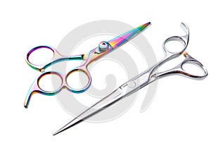 Two professional haircutting scissors isolated, with clipping path. photo