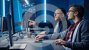 Two Professional IT Programers Discussing Blockchain Data Network Architecture Design and Developm