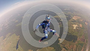 Two professional skydivers jump from airplane fall in sky. Speed. Hold balance.