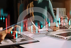 Two professional traides on technical price graph and indicator, red and green candlestick chart and stock trading computer