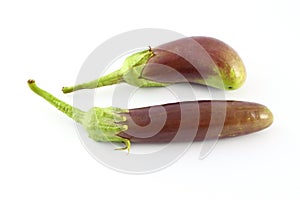 Two purple eggplants