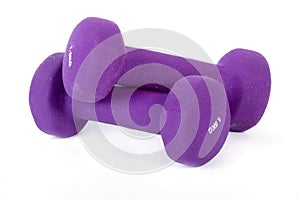 Two purple weights, isolated on white background