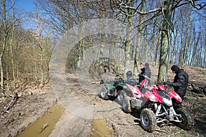 Two quads in forest (ATV) photo