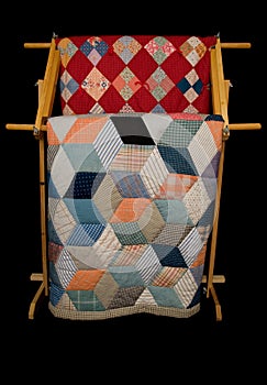 Two Quilts On A Rack