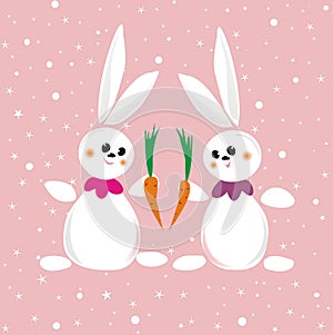 Two rabbits with carrot