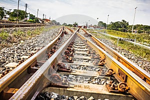 Two railway tracks merge together