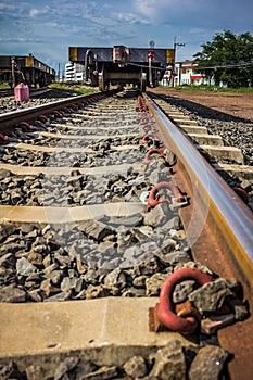 Two railway tracks merge together