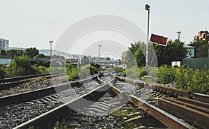 Two railways tracks merge close up