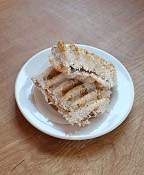 Two Rangi cookies on a white plate