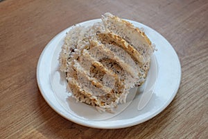 Two Rangi cookies on a white plate