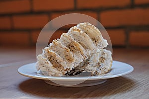 Two Rangi cookies on a white plate photo