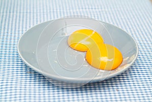 Two raw egg yolks photo
