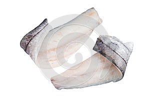 Two raw haddock fish fillets on kitchen table. Isolated on white background