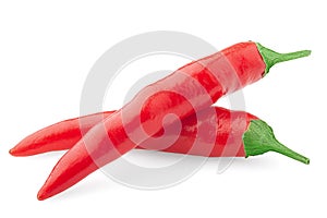 Two raw red hot chilli peppers on white