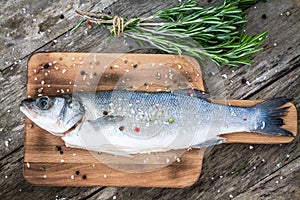 Two raw seabass with rosemary