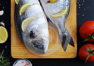 Two ready to cook fresh dorada fish