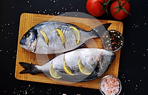 Two ready to cook fresh dorada fish