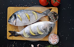 Two ready to cook fresh dorada fish