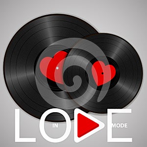 Two Realistic Black Vinyl Records with red heart labels, lettering In love mode and play button. Retro concept of music