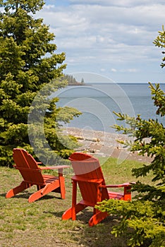 Two Red Adirondack Chair