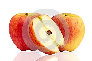 Two red apple whole and halves piece