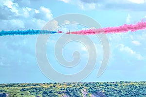 Two Red Arrows planes very close Brean Down Somerset in background