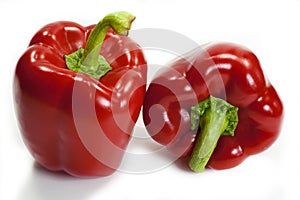 Two red bell peppers