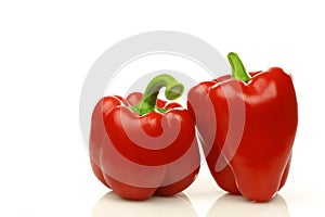 Two red bell peppers