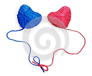 Two red and blue wool hearts