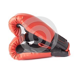 Two red boxing gloves composition