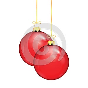 Two red Christmas balls on a gold ribbon