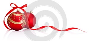 Two red Christmas decoration bauble with ribbon bow isolated on white background