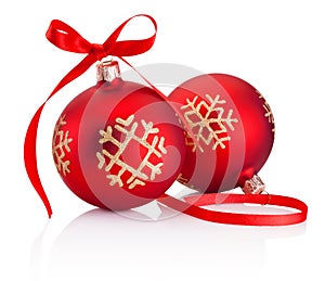 Two red Christmas decoration baubles with ribbon bow isolated on white background