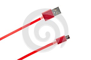 Two red connectors of a micro USB cable on a white isolated background. Horizontal frame
