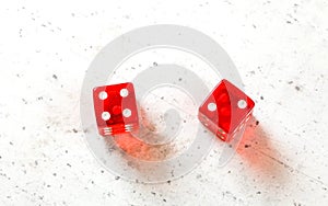 Two red craps dices showing Easy Six Jimmie Hicks number 4 and 2 overhead shot on white board photo
