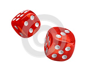 Two red dice in air on white background