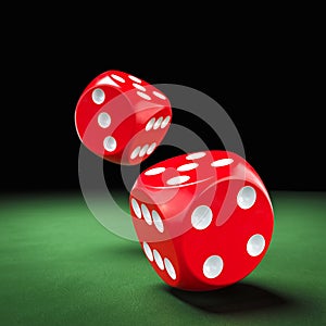 Two red dice rolling on green table in casino 3d