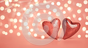 Two red hearts on the background of blurry lights, banner. Valentine`s day card