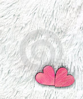 Two red hearts on fur white background. Composition for Valentines day or wedding.Place for text. Copy space.