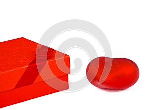 Two red hearts and a gift on white background, concept of valentine day