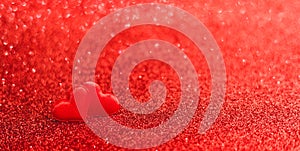 Two red hearts on a red background of sparkles. Valentines day, love, romance, dating concept, long banner with Copy space. Stock