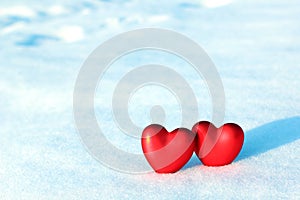 Two Red Hearts in the Snow.