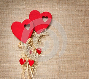 Two red hearts on textile