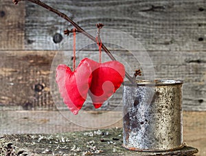 Two Red Hearts twig board rusty tin