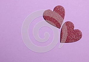 Two red hearts for valentines day background, holidays card with copy space.